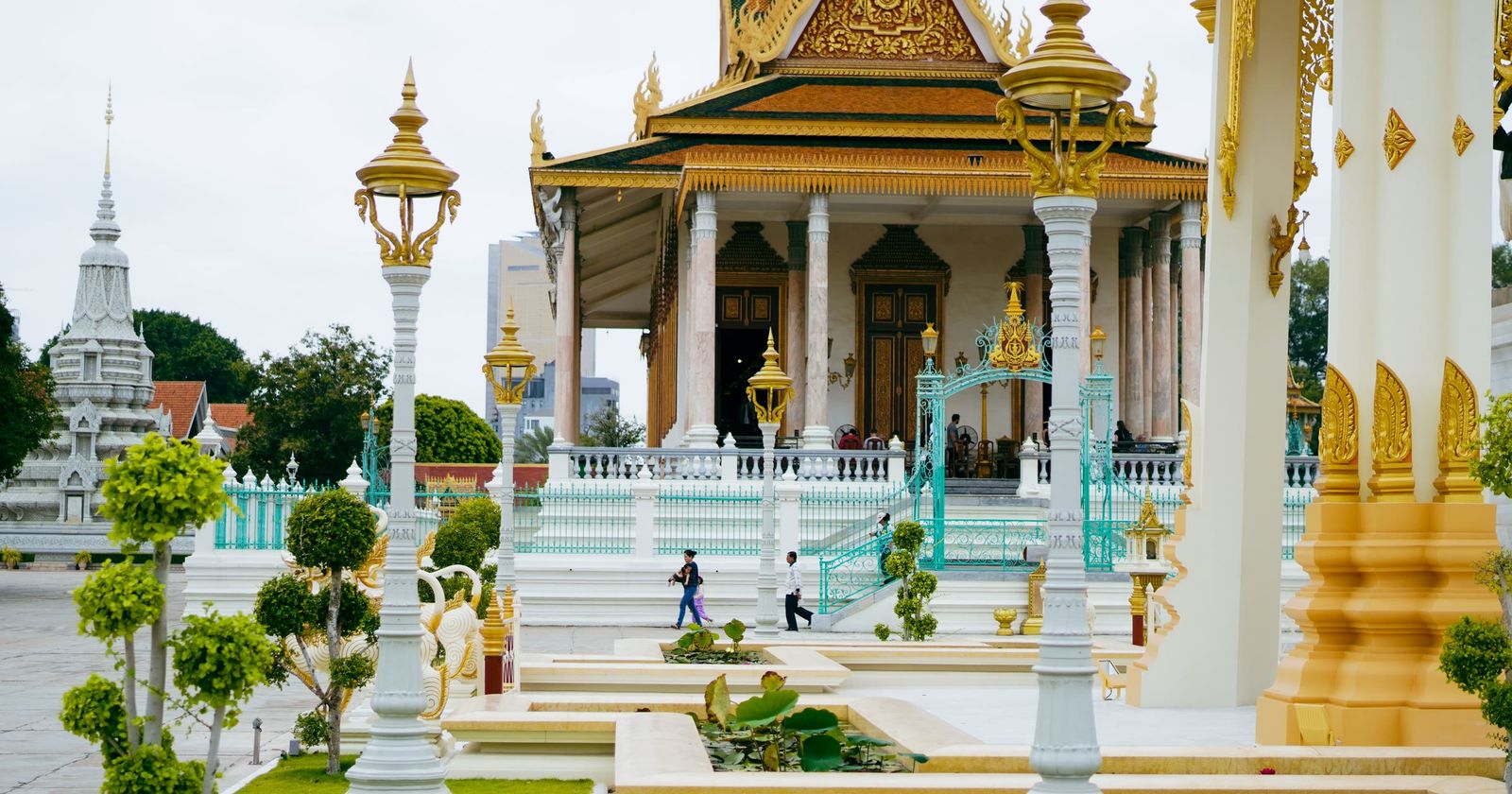 A pavilion at the Royal Palace in Phnom Penh, with gold spires and lamp posts