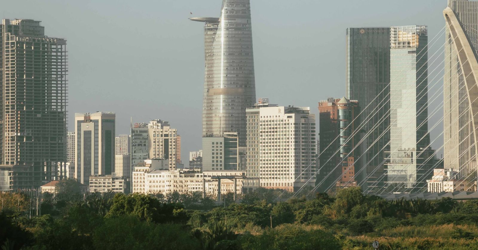 Ho Chi Minh City's skyline, with the tall tapered Bitexco tower